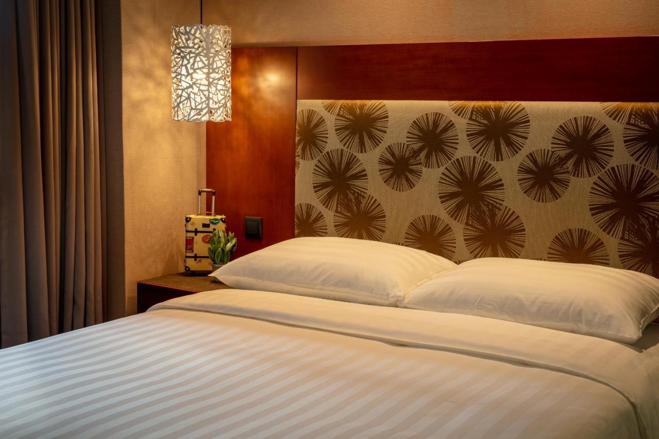 Rich & Free Hotel - Kaifeng 富逸旅趣-北車開封館 Taipei Extérieur photo